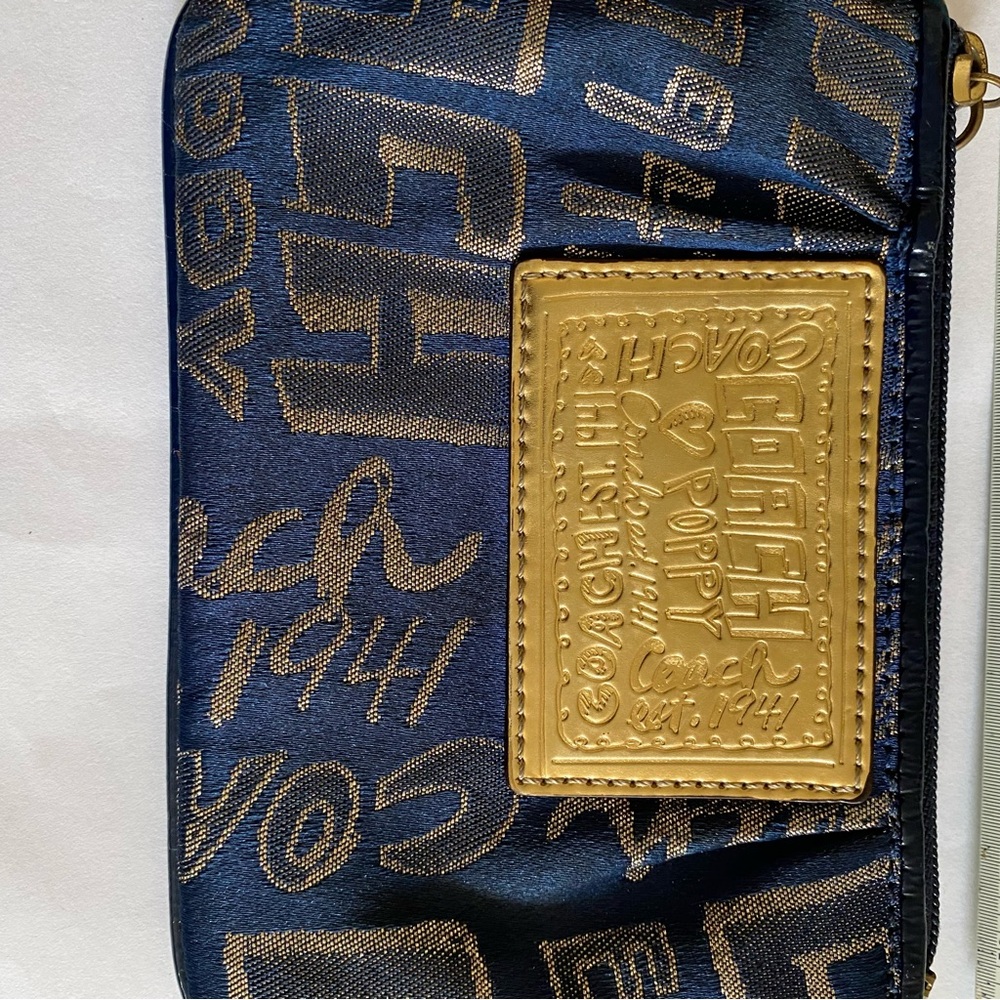 Coach Blue and Gold Clutch with Signature Pattern